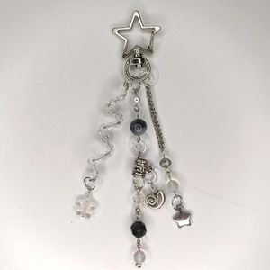 Bag charm with star crystal and glass beads charms and chain. Handmade by me.